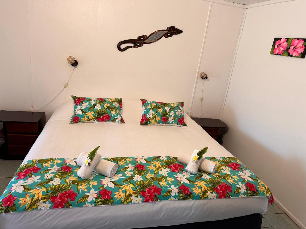 Postel nebo postele na pokoji v ubytování Hotel Hotu Matua by EI