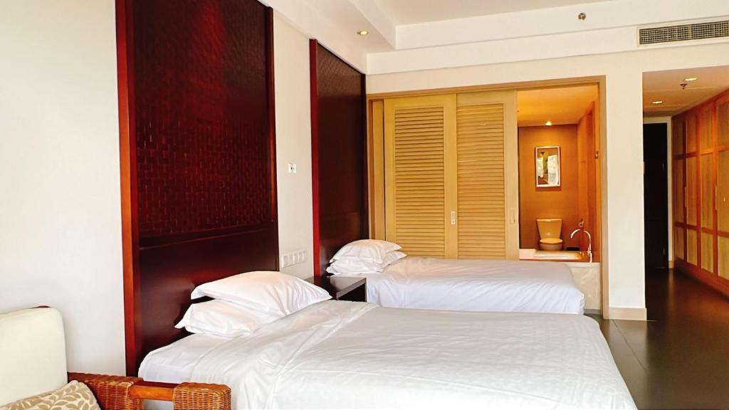 Postel nebo postele na pokoji v ubytování Sheraton Huizhou Beach Resort