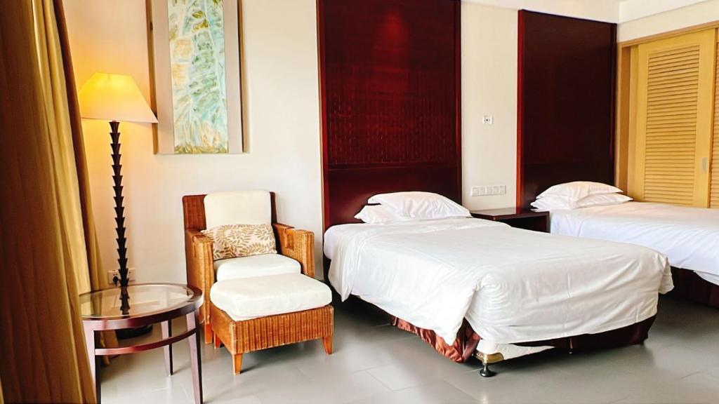 Postel nebo postele na pokoji v ubytování Sheraton Huizhou Beach Resort