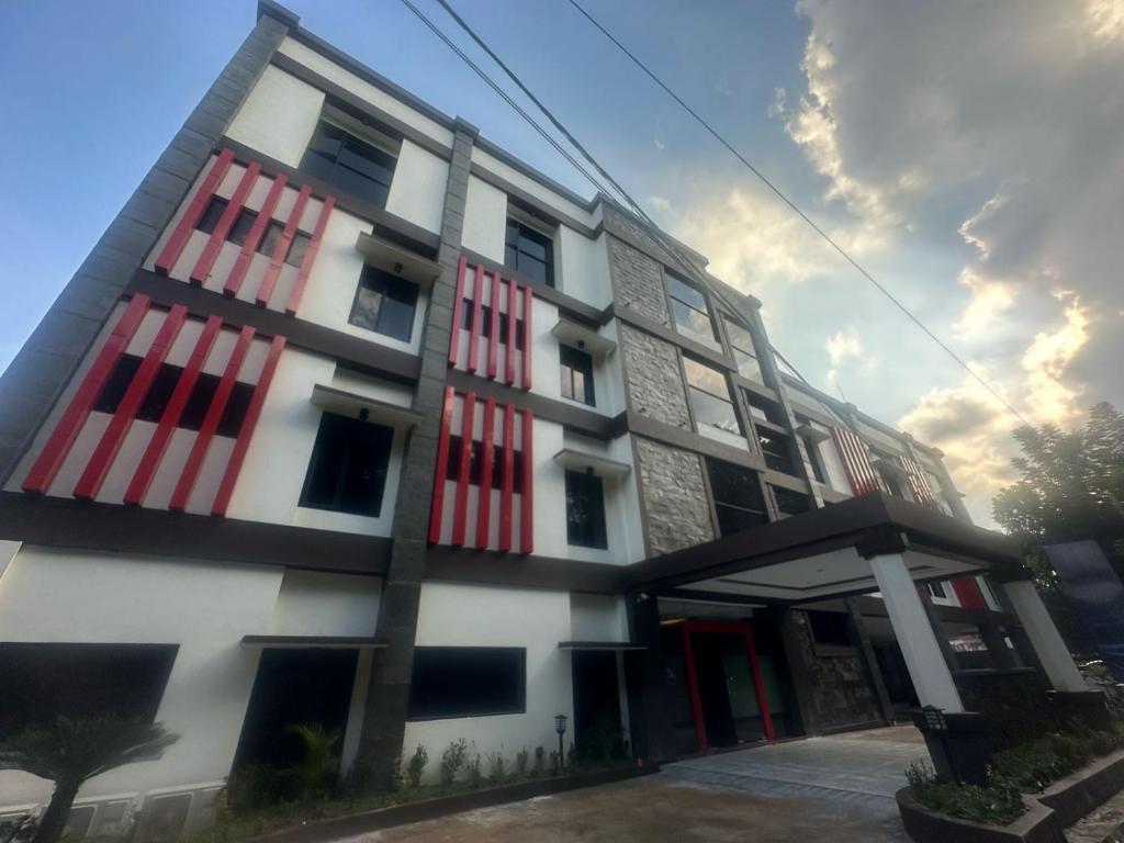 a building with the american flag painted on it at NURIS HOTEL in Lampung