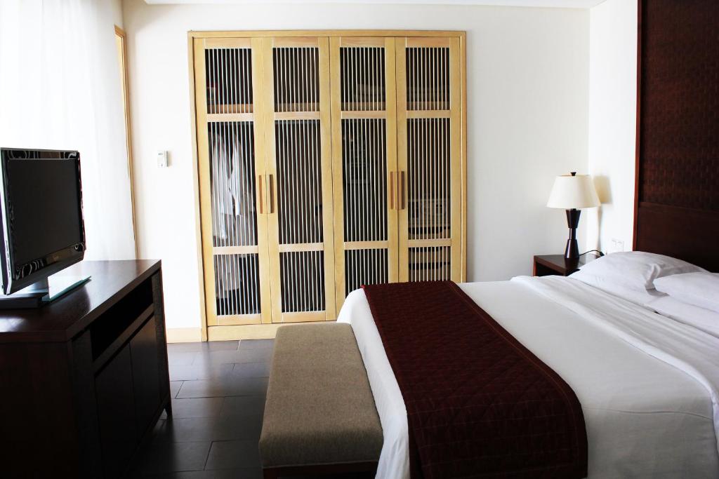 Postel nebo postele na pokoji v ubytování Sheraton Huizhou Beach Resort
