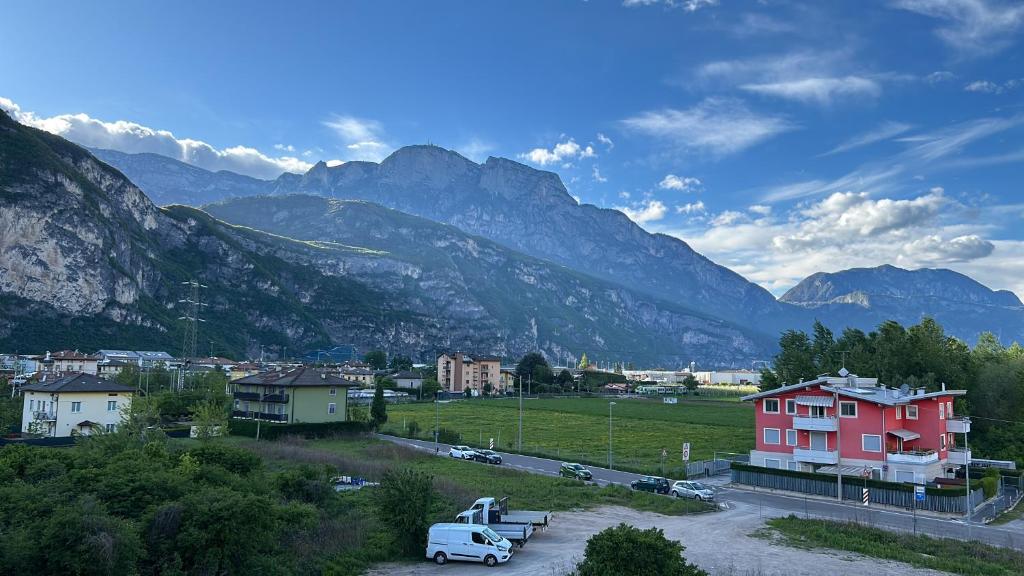 a view of a town with mountains in the background at Casa Canova - private room in sharing apartment in Trento