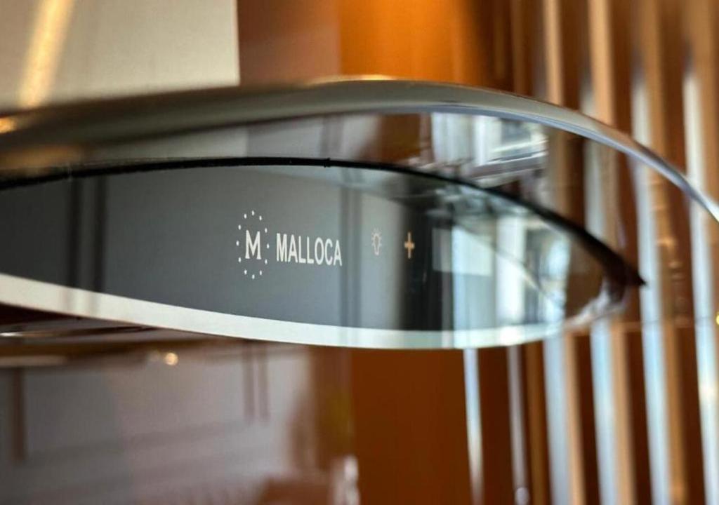 a close up of a wine glass in a wine rack at Apartment with Ocean view in Danang