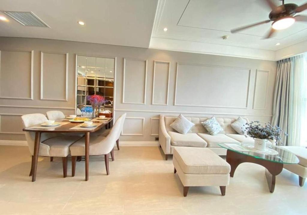 a living room with a table and a couch at Apartment with Ocean view in Danang