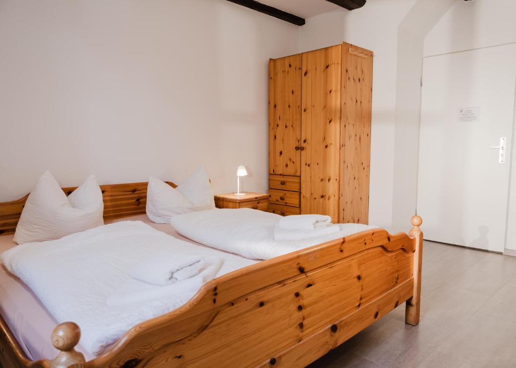 Postel nebo postele na pokoji v ubytování Trobischhof