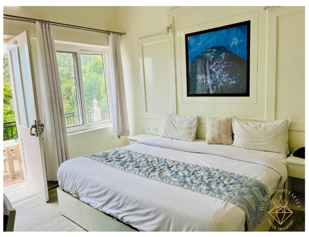 a bedroom with two beds and a window at Hotel Diamond, Mussoorie in Mussoorie