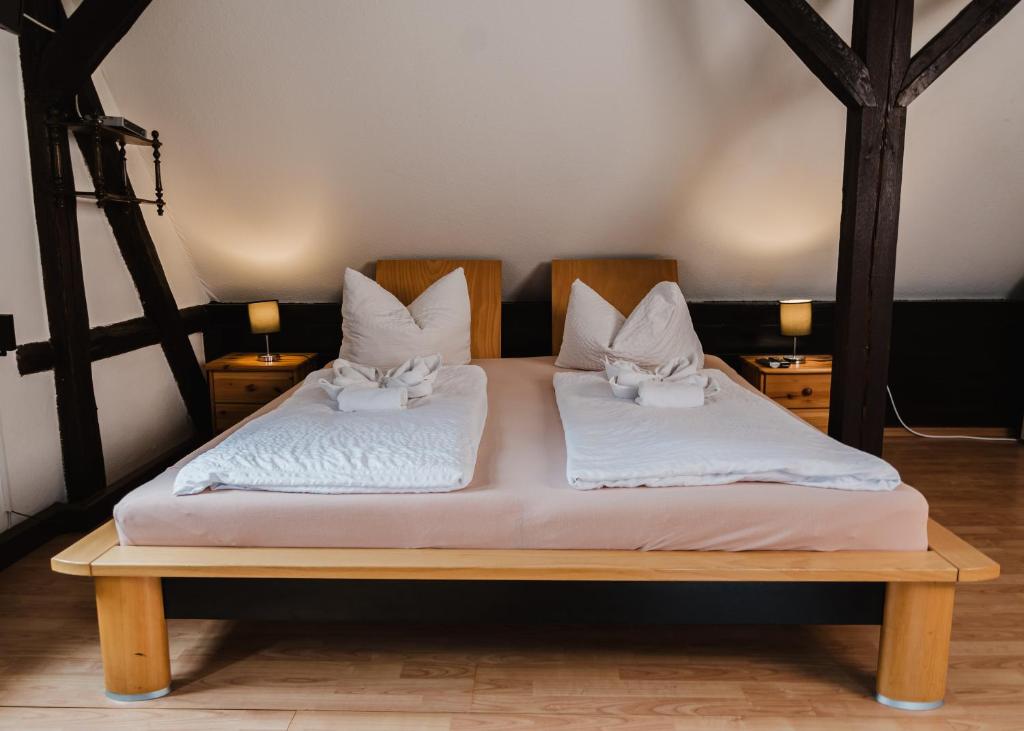 Postel nebo postele na pokoji v ubytování Trobischhof