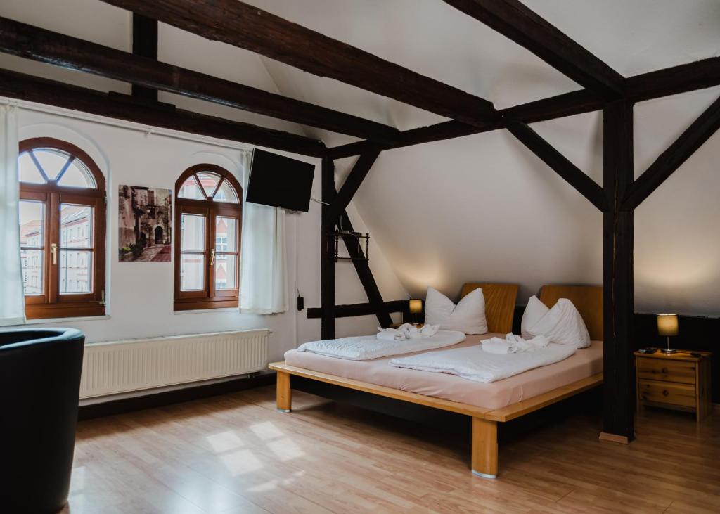 Postel nebo postele na pokoji v ubytování Trobischhof