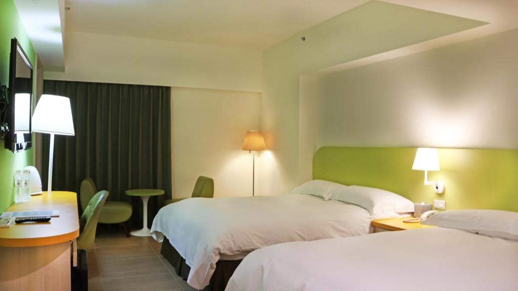 Postel nebo postele na pokoji v ubytování Fullon Poshtel Kenting