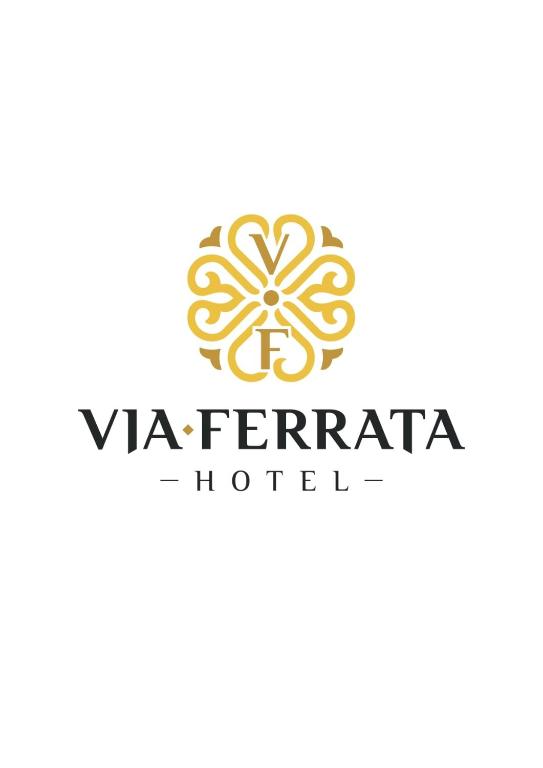 a logo for a hotel with a mandala at Via Ferrata Hotel in Prousós
