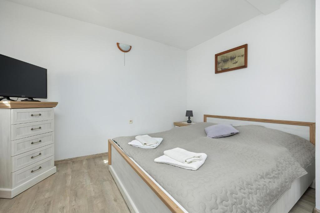 Postel nebo postele na pokoji v ubytování Older Krab