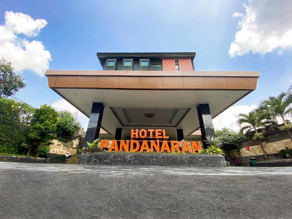 a hotel pambanan sign in front of a building at Pandanaran Prawirotaman Yogyakarta in Yogyakarta