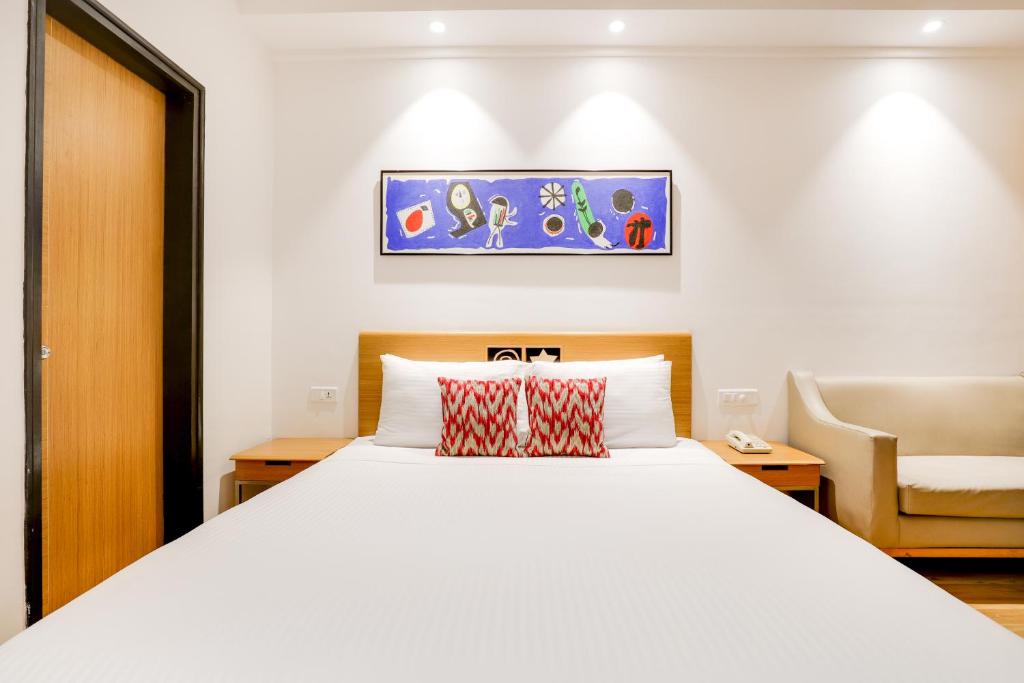 Postel nebo postele na pokoji v ubytování Lemon Tree Hotel Chandigarh