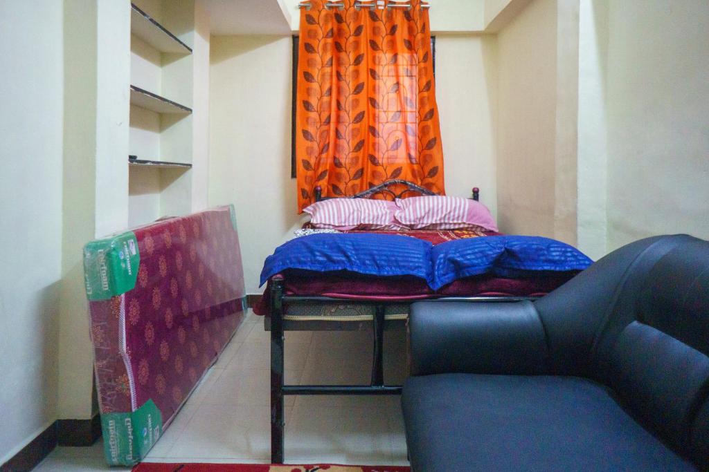 Postel nebo postele na pokoji v ubytování Villa Sea Blue - Homestay in Pondicherry