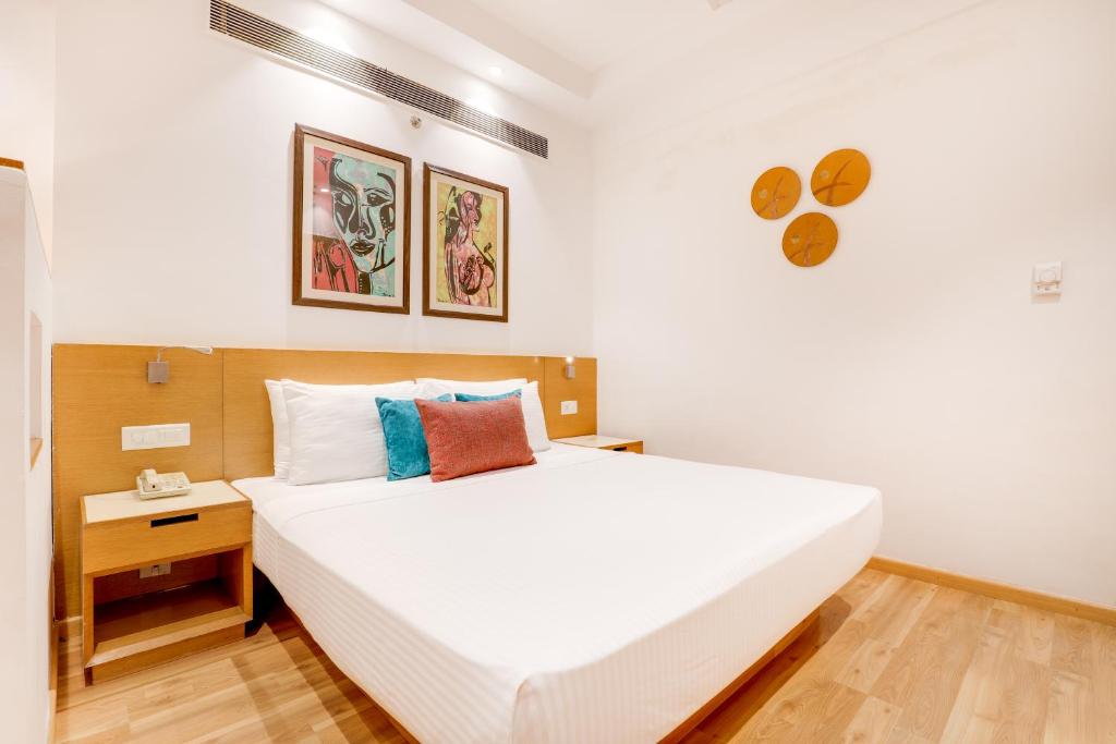 Postel nebo postele na pokoji v ubytování Lemon Tree Hotel Chandigarh