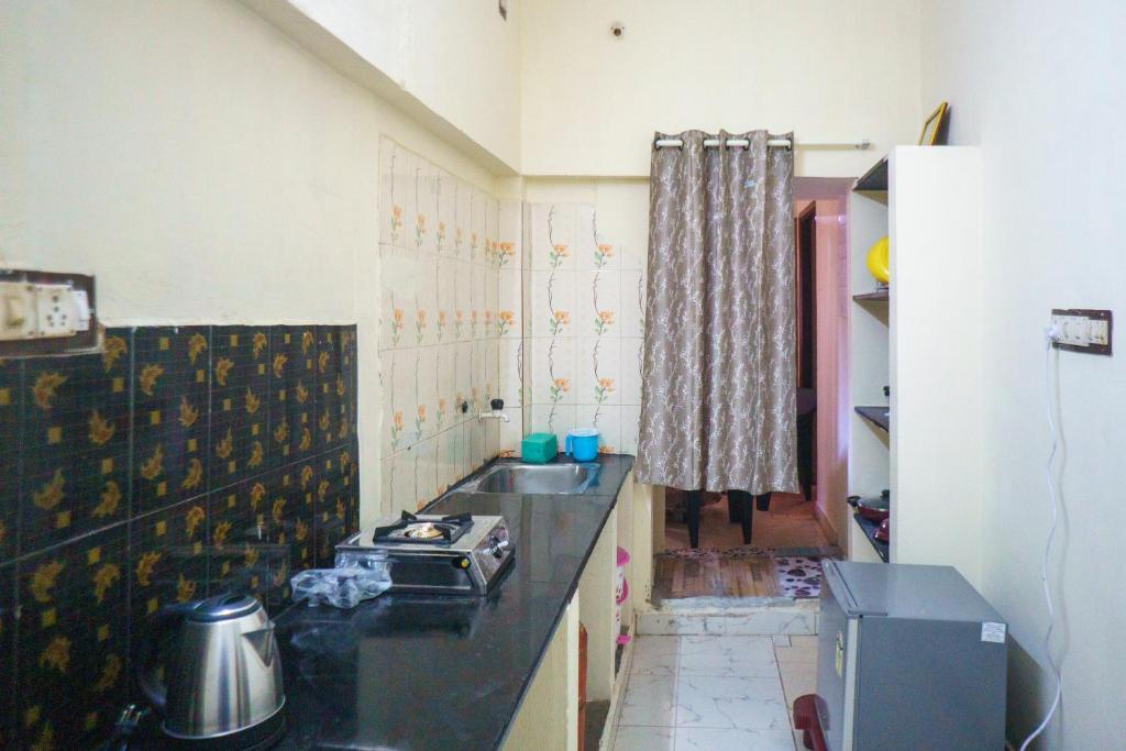 Kuchyň nebo kuchyňský kout v ubytování Villa Sea Blue - Homestay in Pondicherry