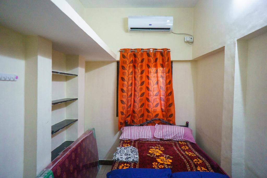 Postel nebo postele na pokoji v ubytování Villa Sea Blue - Homestay in Pondicherry