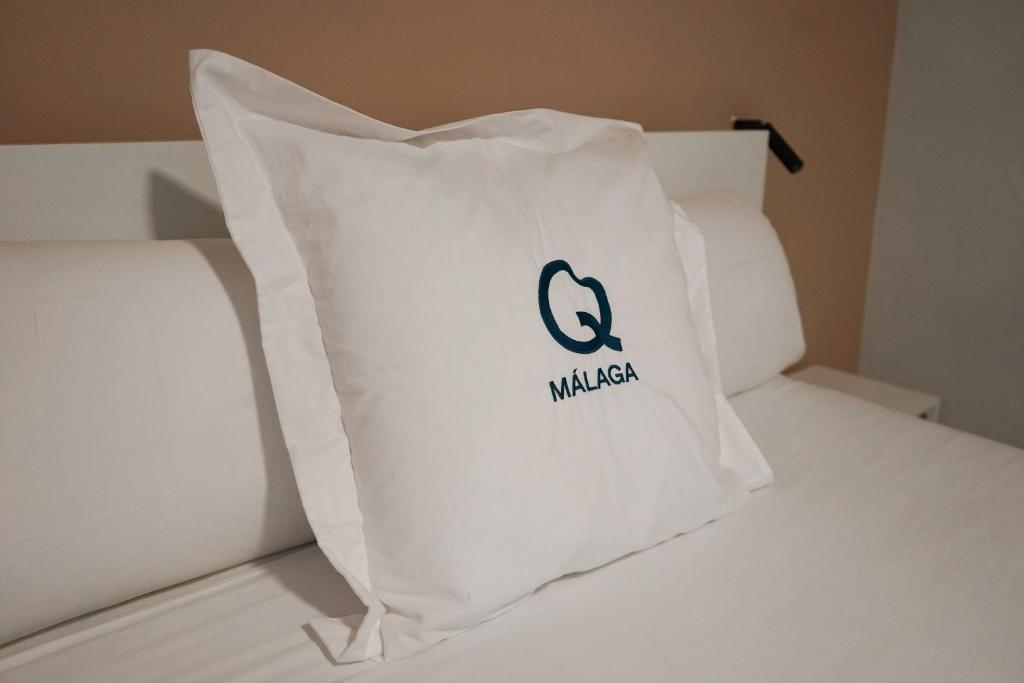 Posteľ alebo postele v izbe v ubytovaní Aqua Apartments Málaga