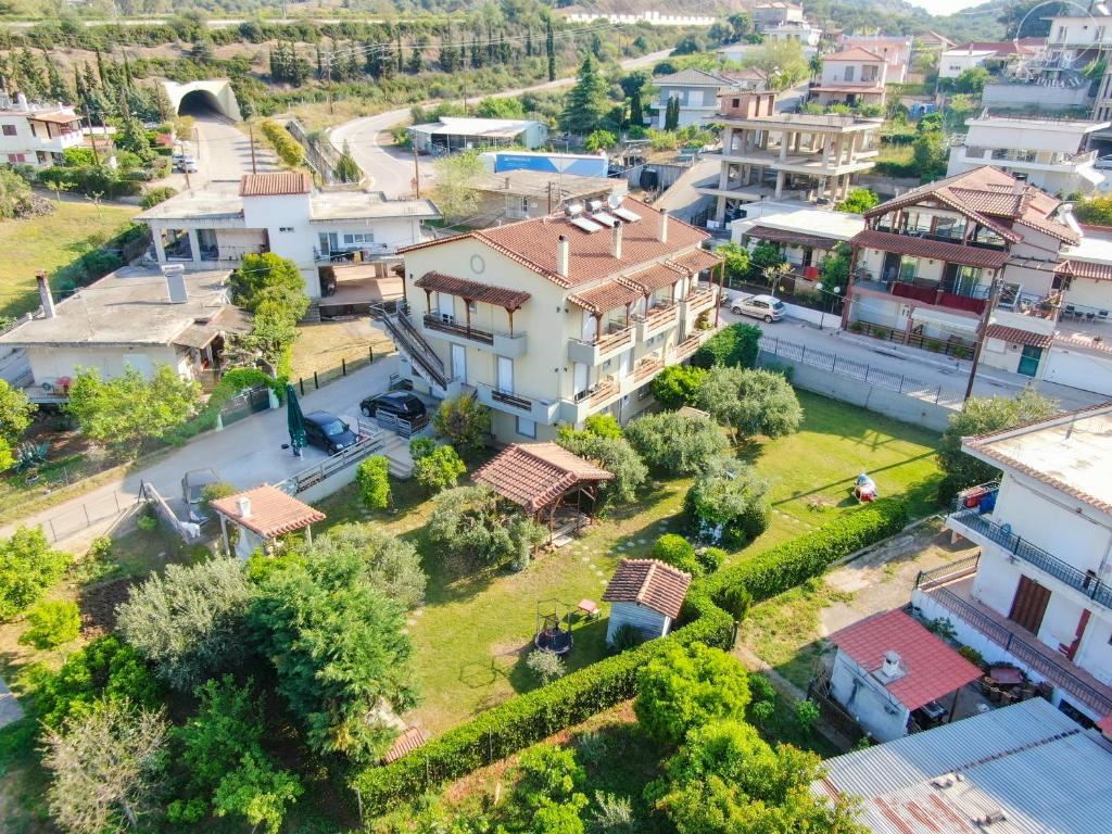an aerial view of a village with houses at elia villa raches in Paralia Rachon