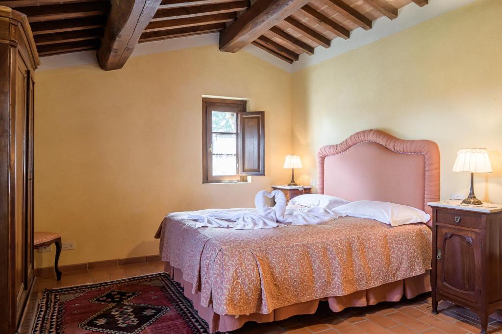 Postel nebo postele na pokoji v ubytování I Grandi Di Toscana