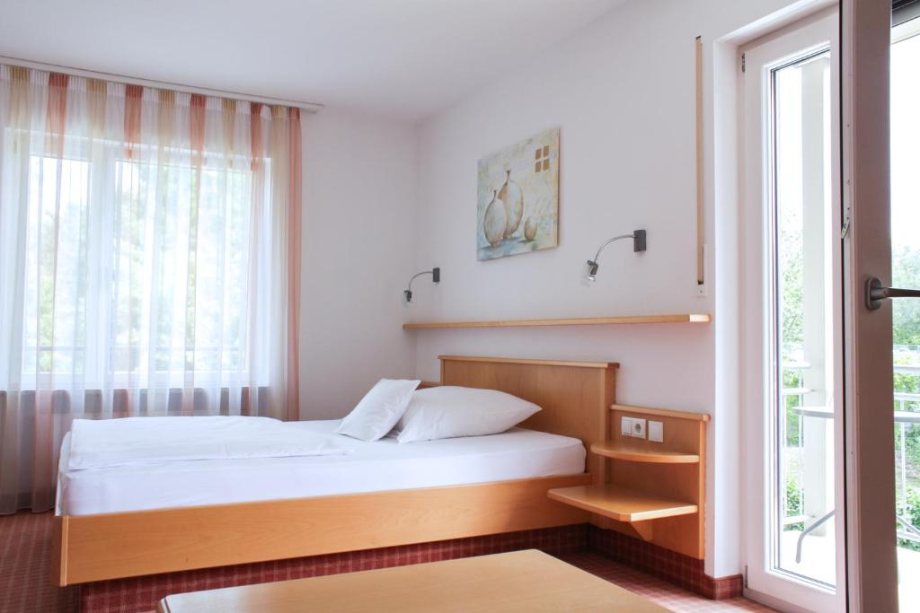 Postel nebo postele na pokoji v ubytování Schweigerhof