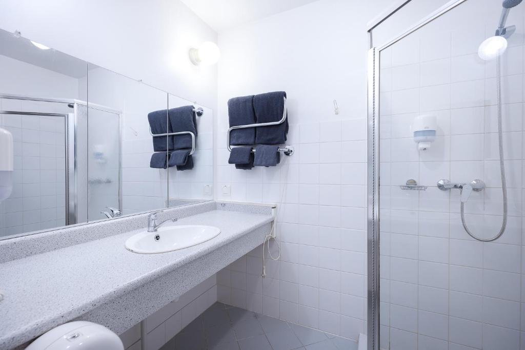 Koupelna v ubytování Peoleo Hotell