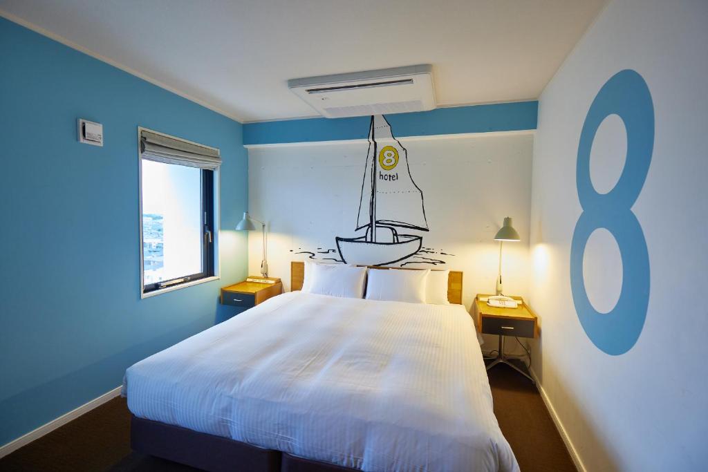 Postel nebo postele na pokoji v ubytování 8 Hotel Shonan Fujisawa