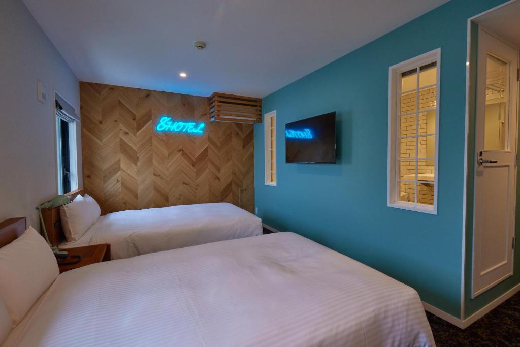 Postel nebo postele na pokoji v ubytování 8 Hotel Shonan Fujisawa