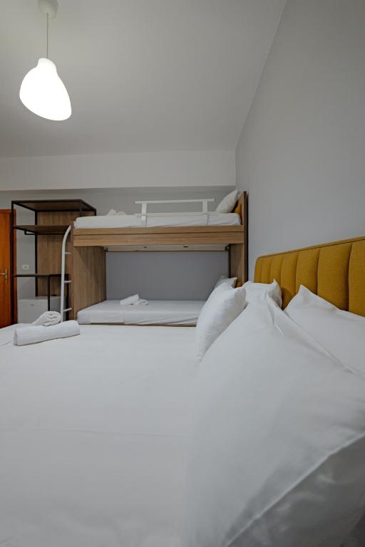 Postel nebo postele na pokoji v ubytování Hotel Holiday