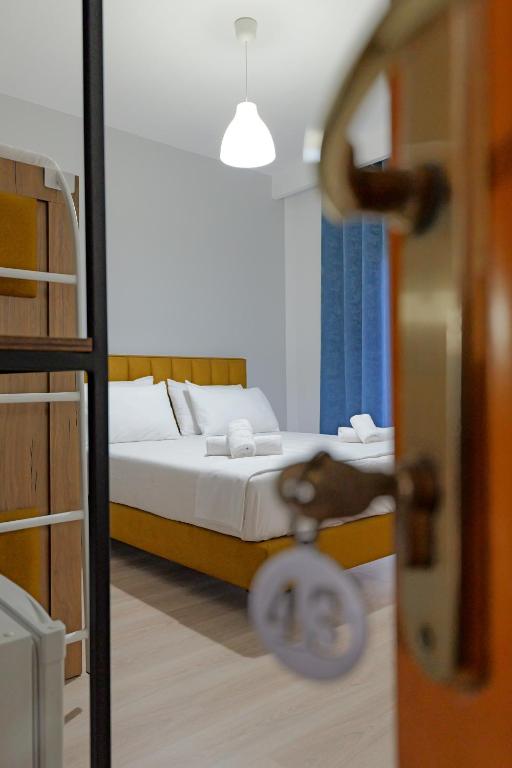 Postel nebo postele na pokoji v ubytování Hotel Holiday