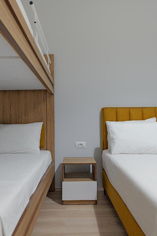 Postel nebo postele na pokoji v ubytování Hotel Holiday