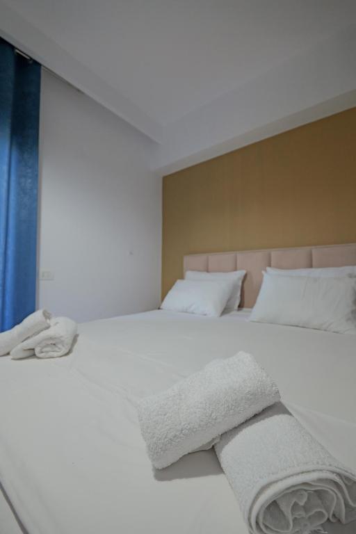 Postel nebo postele na pokoji v ubytování Hotel Holiday