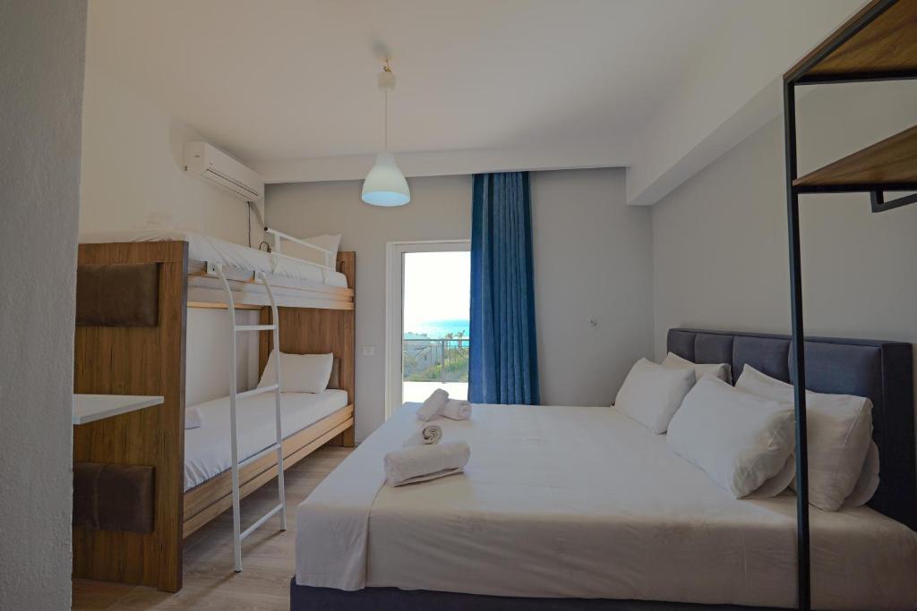 Postel nebo postele na pokoji v ubytování Hotel Holiday