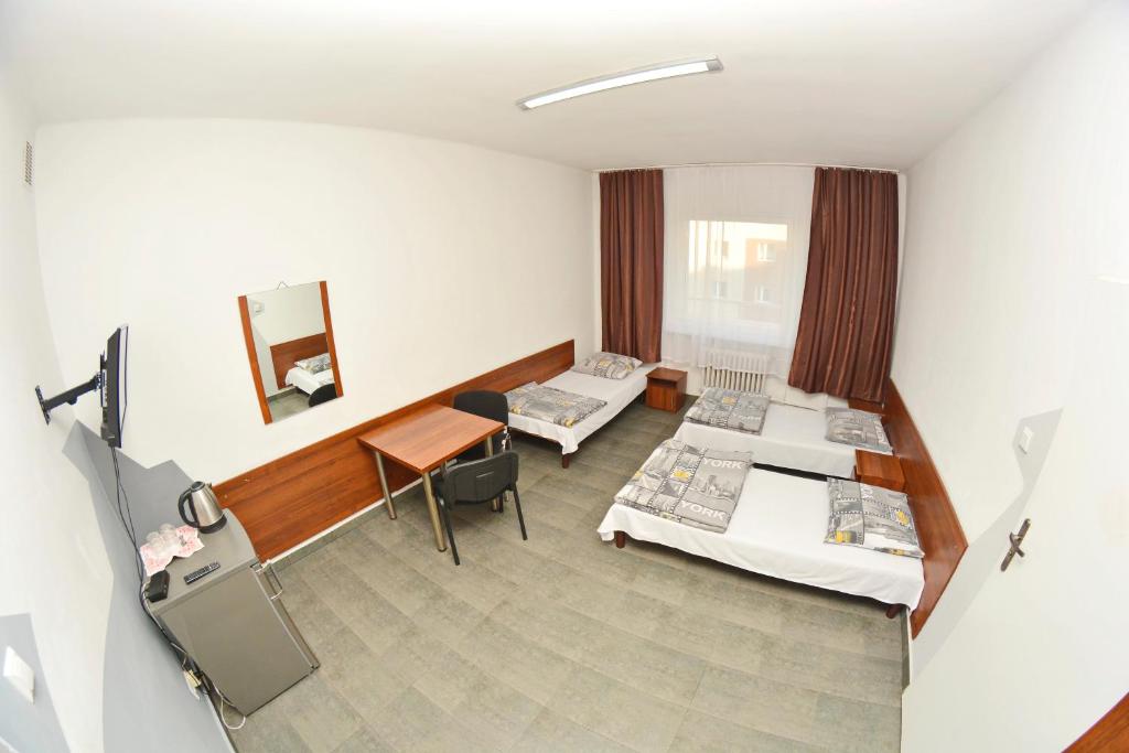 Postel nebo postele na pokoji v ubytování Twój Hostel Klimczoka 7