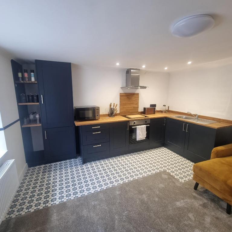 Kuchyňa alebo kuchynka v ubytovaní Quite central flat