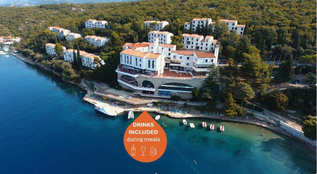 an aerial view of a resort on an island in the water at Uvala Scott in Kraljevica