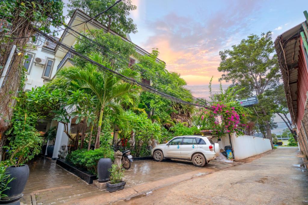 a car parked on the side of a street at P5 Angkor Residence in Siem Reap