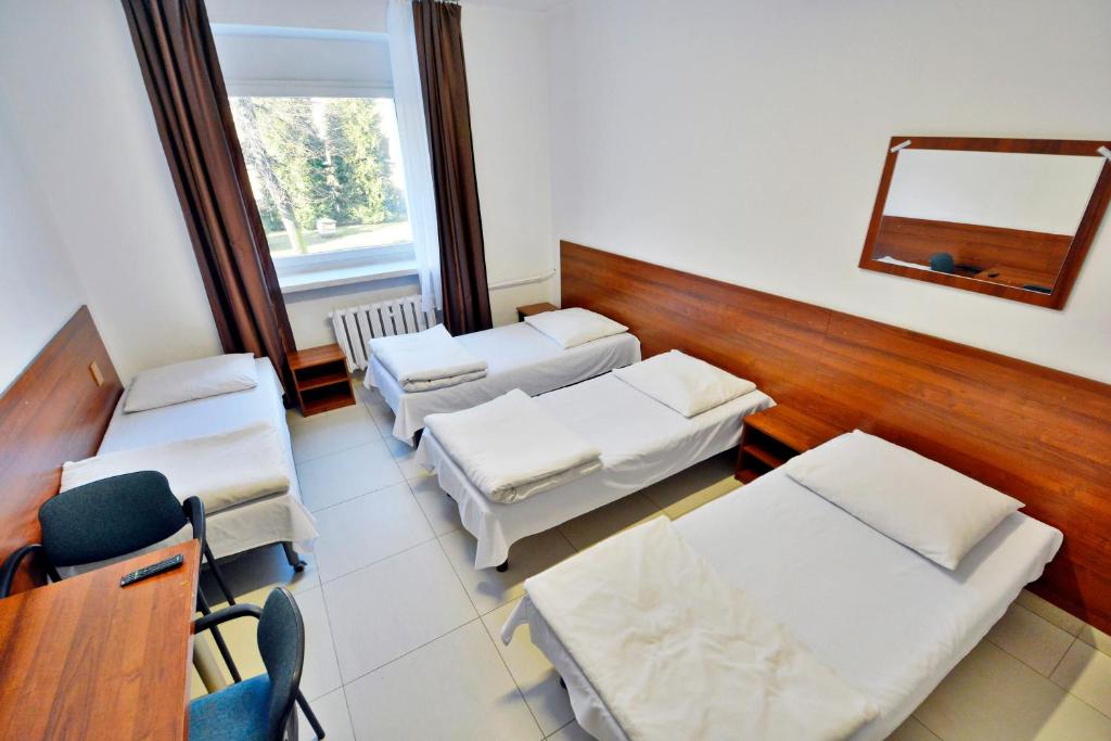 Postel nebo postele na pokoji v ubytování Twój Hostel Klimczoka 7