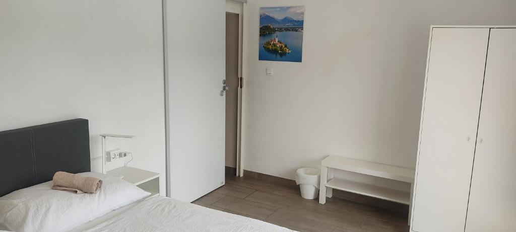 Postel nebo postele na pokoji v ubytování Hacienda Bled Rooms