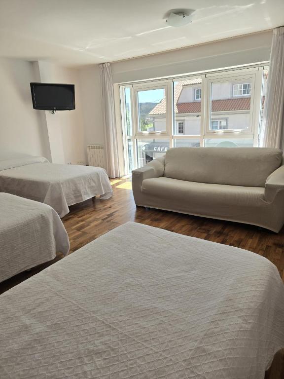 Posteľ alebo postele v izbe v ubytovaní Noja Rooms