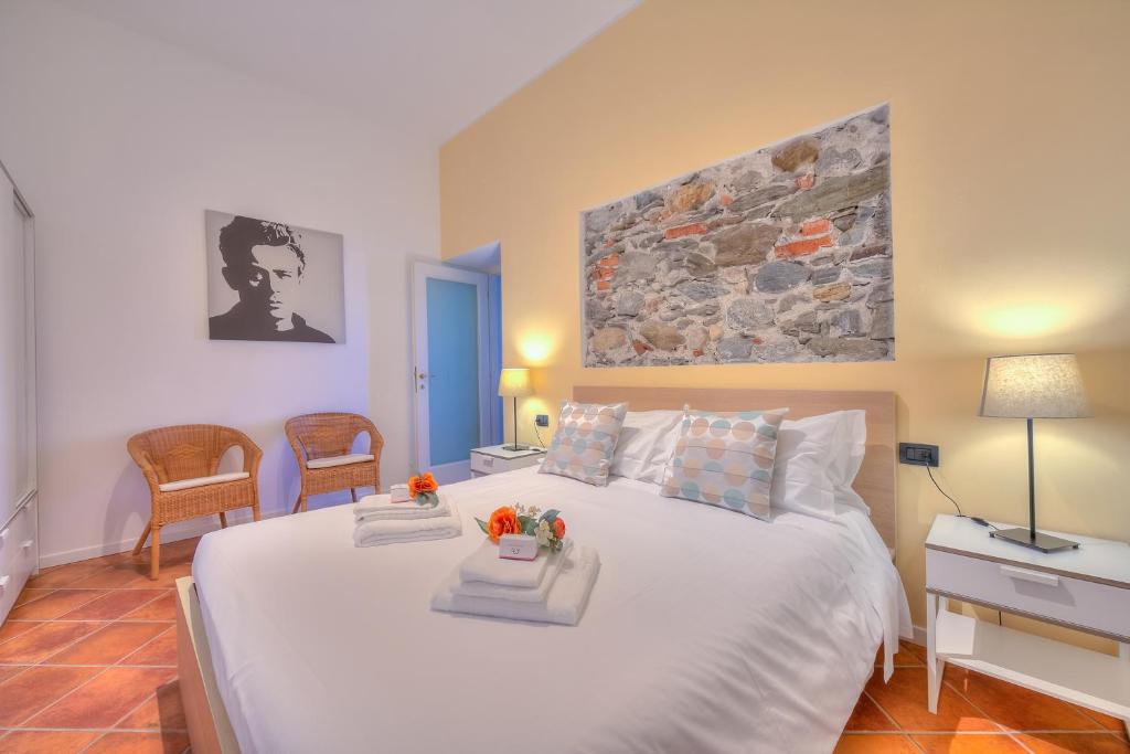 Letto o letti in una camera di Aparthotel Arona