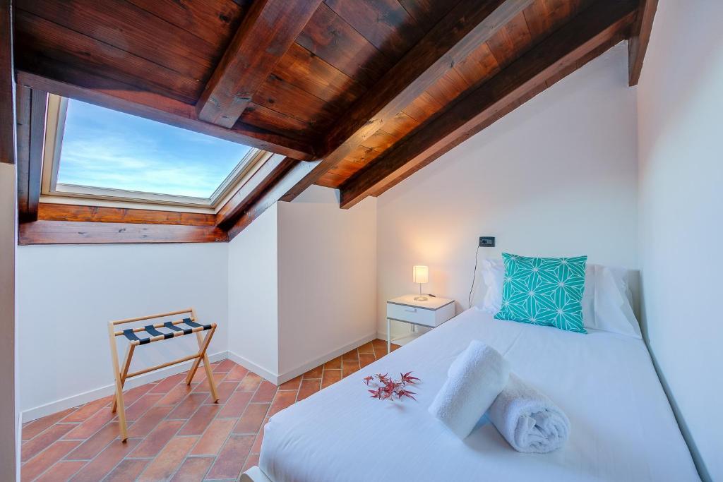 Letto o letti in una camera di Aparthotel Arona