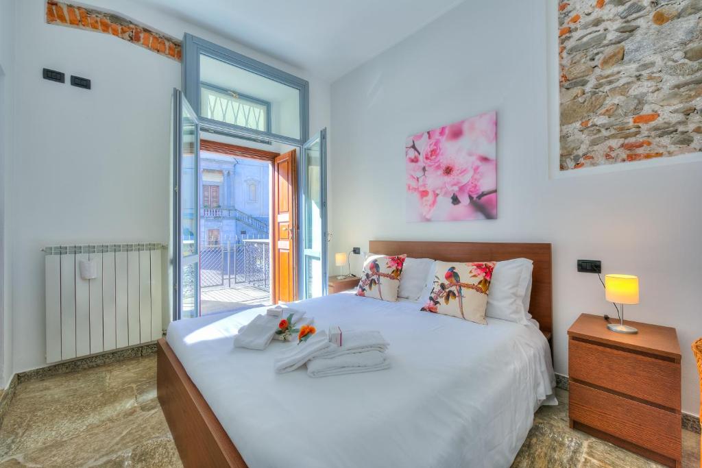 Letto o letti in una camera di Aparthotel Arona