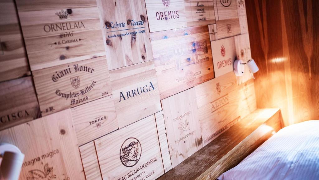 Ein Bett oder Betten in einem Zimmer der Unterkunft Boutique Hotel Kronenhof