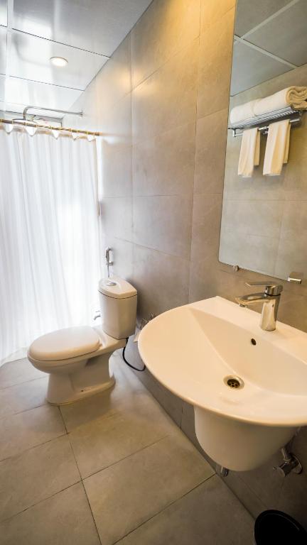 Koupelna v ubytování Bloom Hotel - Magarpatta