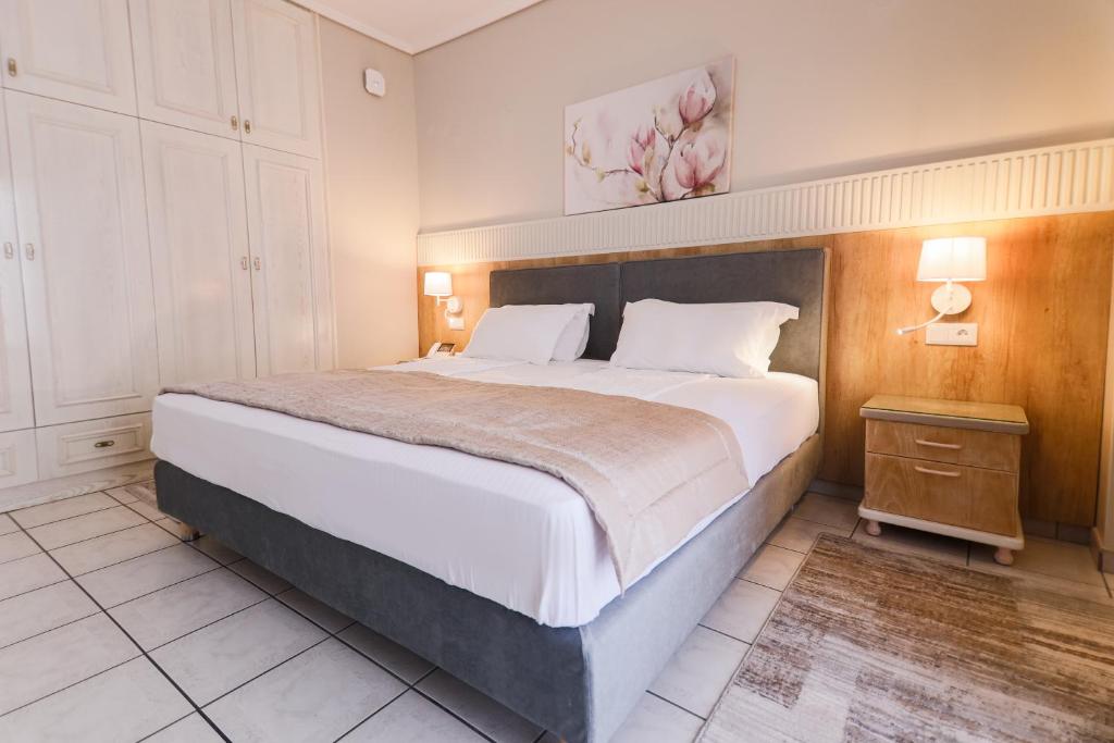 Postel nebo postele na pokoji v ubytování Hotel Strass