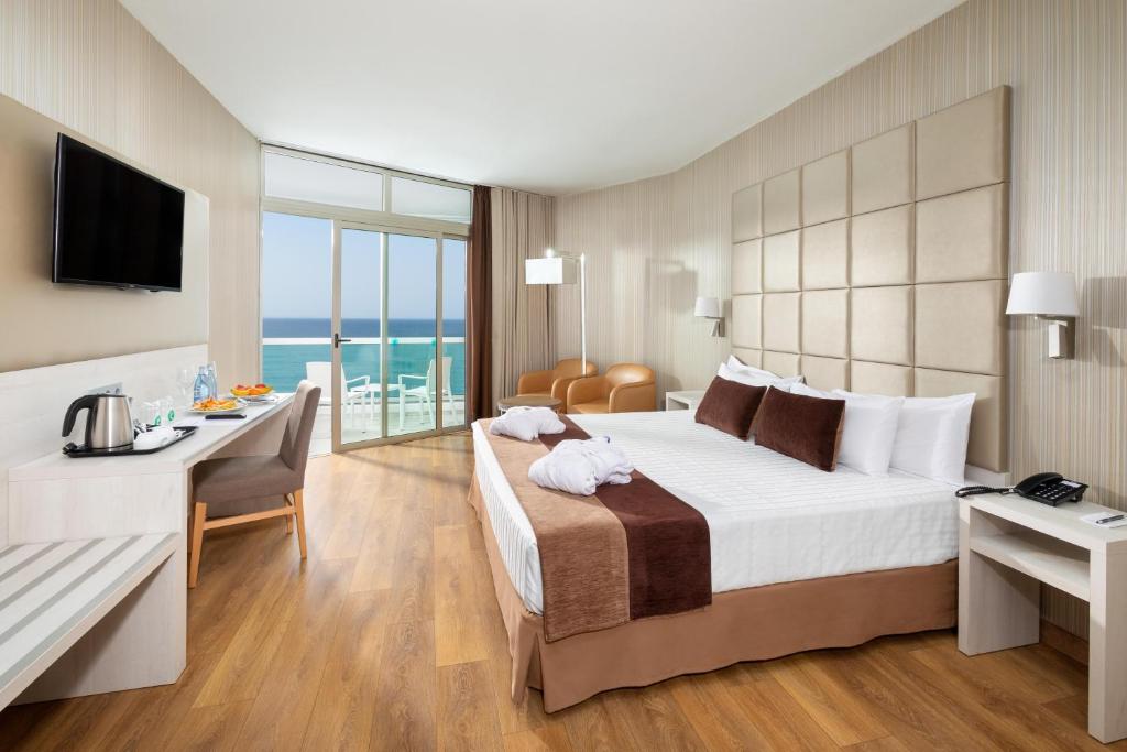 Postel nebo postele na pokoji v ubytování Hotel Best Semiramis