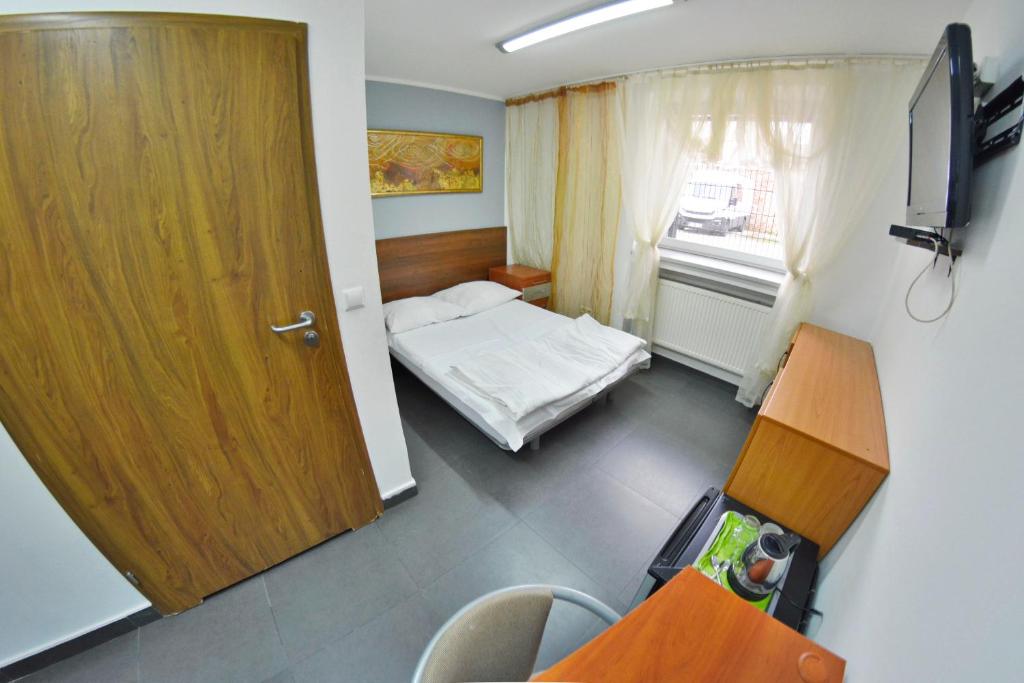 Postel nebo postele na pokoji v ubytování Twój Hostel Klimczoka 7