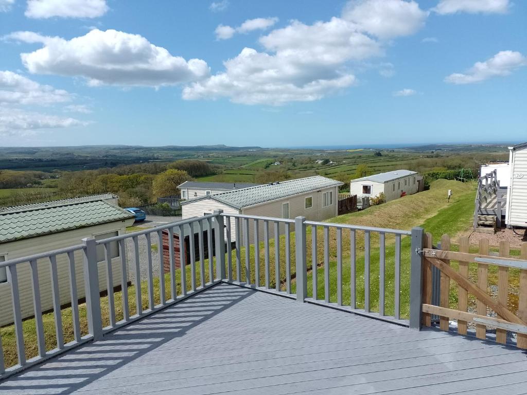 a view from the deck of a house at Ploedle Lodge, Cosy holiday letting, near Bude. in Bridgerule