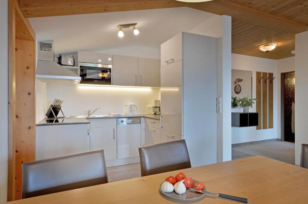 Kuchyň nebo kuchyňský kout v ubytování Gästehaus Rottenspacher